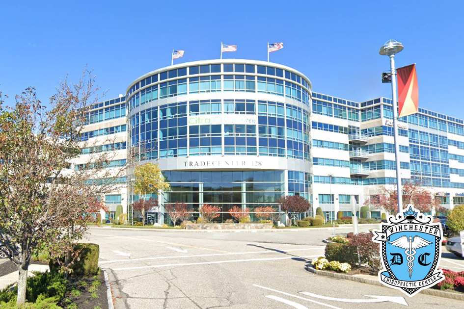 The front entrance of 300 Trade Center building in Woburn, MA.