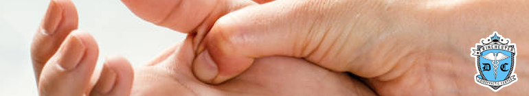 Close up of a chiropractic technique treating a hand with carpal tunnel syndrome.