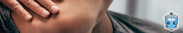 Close up of shoulder being treated by chiropractic.